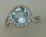 10 Karat White Gold Diamond Ring With Round Blue Topaz Stone