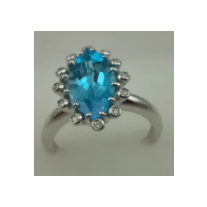 10 Karat White Gold Diamond Ring With Oval Blue Topaz Stone