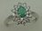 10 Karat White Gold Diamond Ring With Flower Shaped Emerald Stone