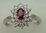 10 Karat White Gold Diamond Ring With Flower Shaped Ruby Stone