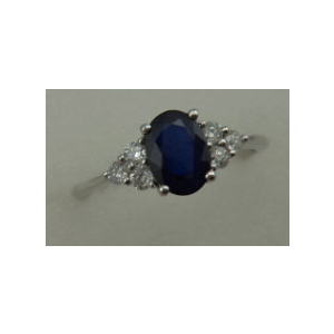 10 Karat White Gold 4 Claws Diamond Ring With Sapphire Stone