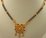 22 Karat Gold 2 Row Mangalsutra with Antique Meenakari Flower Design Pendant