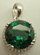 Sterling Silver with Synthetic Round Emerald and Cubic Zirconia Pendant