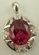 Sterling Silver Cubic Zirconia Oval Shaped Pendant with Synthetic Ruby  