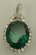 Sterling Silver Cubic Zirconia Pendant with Oval Shaped Synthetic Emerald