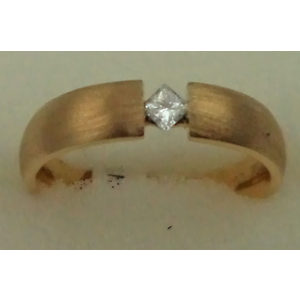 18 Karat Yellow Gold with 0.10 Carat Diamond Tension Set Band