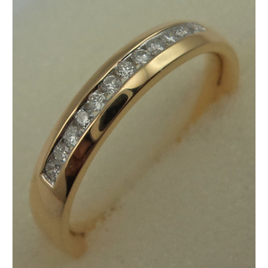 10 Karat Yellow Gold with 0.15 Carat Diamond Channel Set Band 