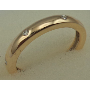 9 Karat Yellow Gold with 0.07  Carat Diamond Band