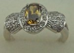 18 Karat White Gold with 0.60 Carat Diamond Oval Shaped Yellow Sapphire Ring-diamonds-Lotus Gold