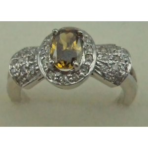 18 Karat White Gold with 0.60 Carat Diamond Oval Shaped Yellow Sapphire Ring