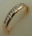 10 Karat Yellow Gold with 0.15 Carat Diamond Channel Set Band 