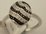 10 Karat White Gold with  0.15 Carat Diamond Oval Ring with Black Diamonds 