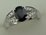 10 Karat White Gold Diamond Shoulder Ring with Oval Shaped Sapphire