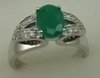 10 Karat White Gold Diamond Shoulder Ring with Oval Shaped Emerald-diamonds-Lotus Gold