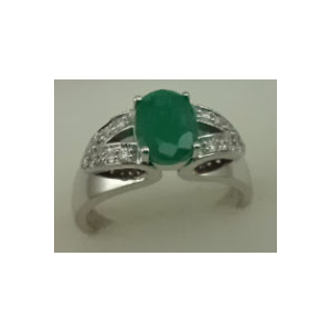 10 Karat White Gold Diamond Shoulder Ring with Oval Shaped Emerald