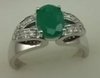 10 Karat White Gold Diamond Shoulder Ring with Oval Shaped Emerald-diamonds-Lotus Gold