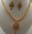 22Karat Gold with Cubic Zirconia, Ruby and Emerald Necklace Set 