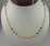 22 Karat Gold Ball Mala with Ruby and Emerald 
