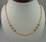 22 Karat Gold Ball Mala with Ruby and Emerald 