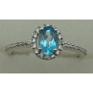 10 Karat White Gold Daimond Ring With Blue Topaz Stone