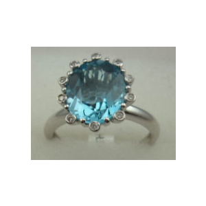 10 Karat White Gold Daimond Ring With Blue Topaz Stone