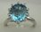 10 Karat White Gold Daimond Ring With Blue Topaz Stone